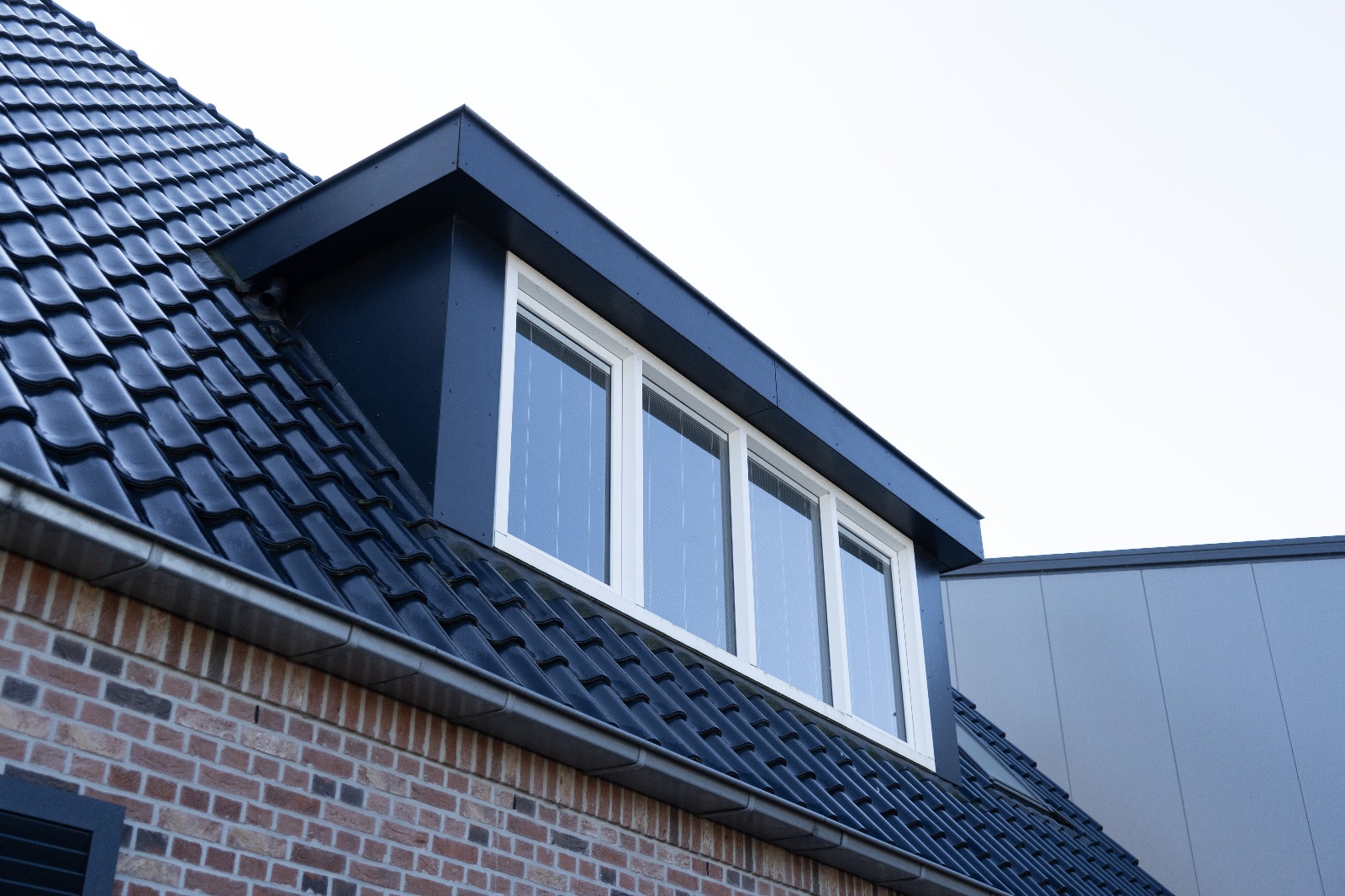Kunststof kozijnen in een dakkapel